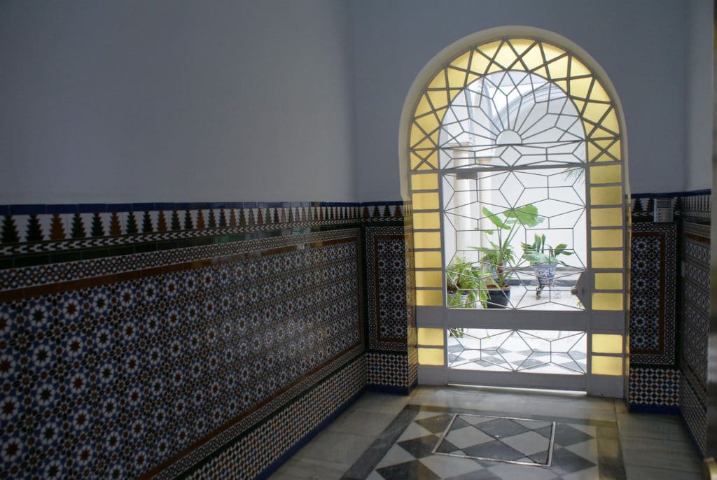 Patios de Séville à la fois jardin et cour d'intérieur.