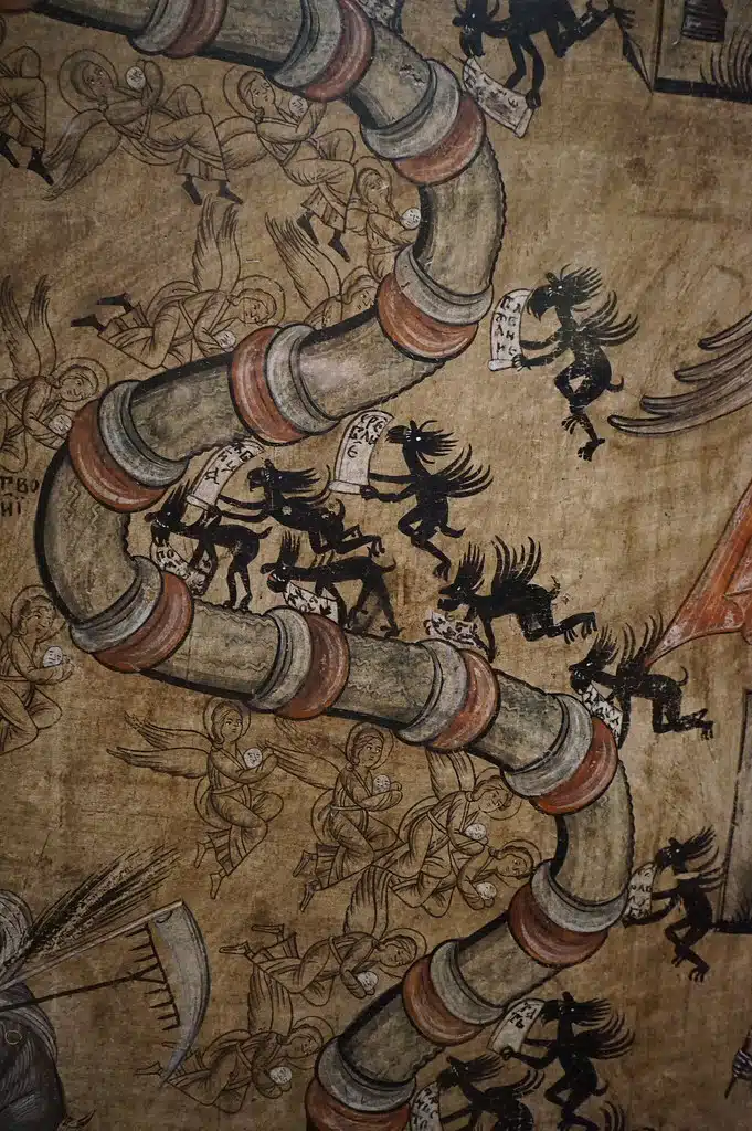 Anges et démons luttant pour des âmes sur une toile d'art orthodoxe au musée d'art sacré Ciolek à Cracovie.