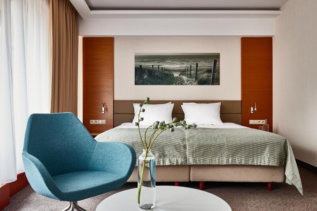 Chambre de l'Hotel Dom Zdrojowy à Jastarnia sur la Presqu'île de Hel.