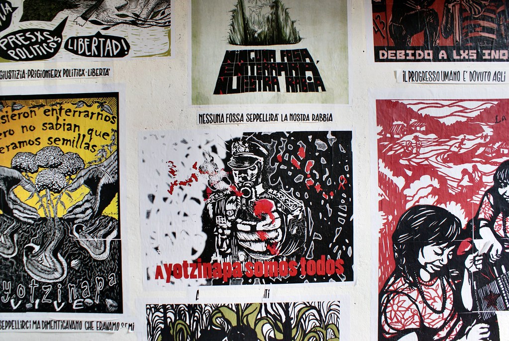 Street art : Affiches dans le squat culturel du XM24 (aujourd'hui fermé) à Bologne.