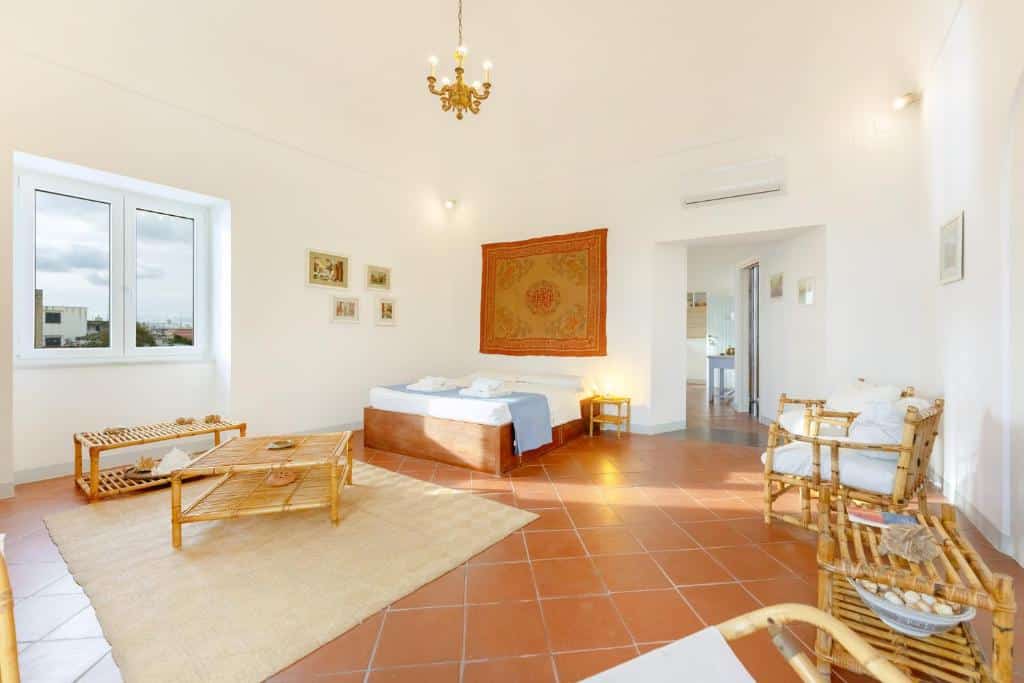 Chambre de l'appartement hotel Torretta Corricella - Punta Pizzaco à Procida.