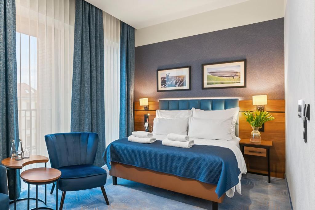 Chambre de l'Hotel Diament Plaza à Katowice.