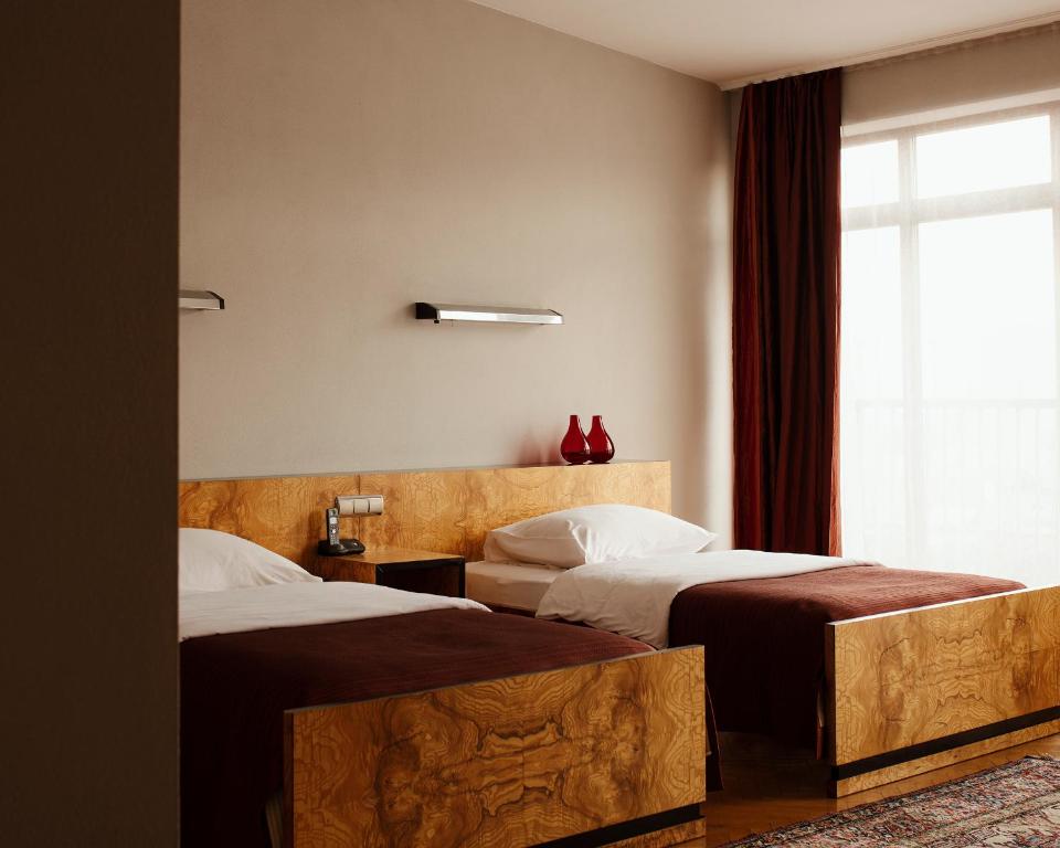 Chambre de l'Hotel Monopol à Katowice.