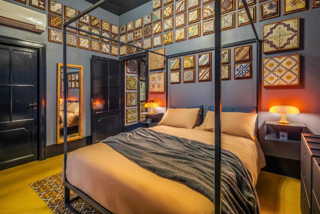Chambre de l'hotel de charme Le Stanze al Genio di Darlon à Palerme.