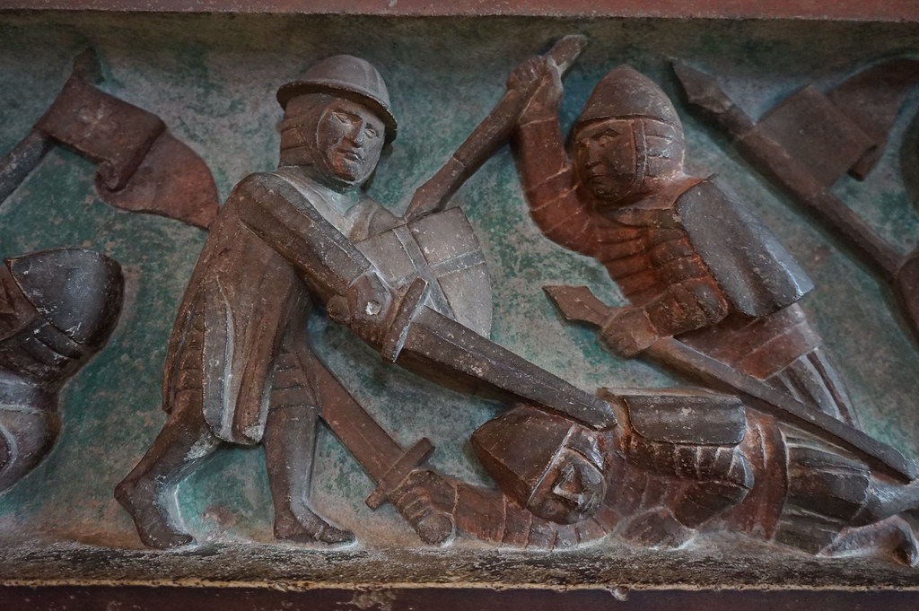 Décoration d'une cheminée dans la salle de repos à côté du réfectoire.