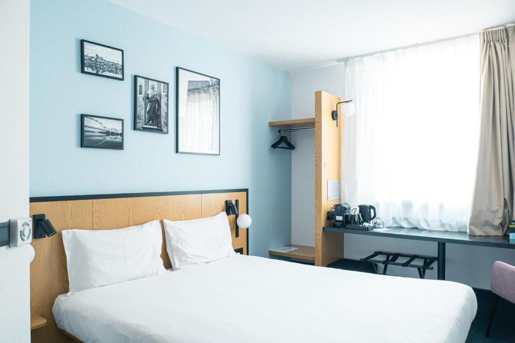 Chambre de B&B hotel à Torun.
