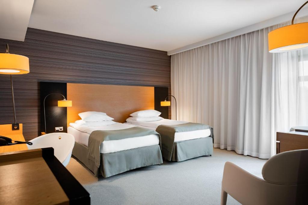 Chambre de l'Hotel Bulwar à Torun.