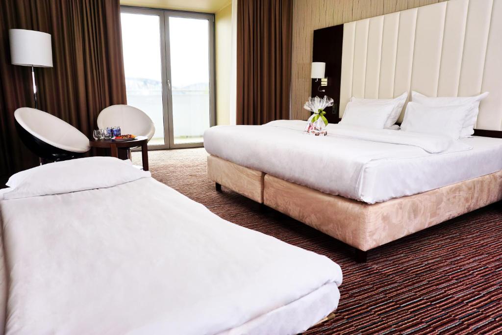 Chambre de l'Hotel Copernicus à Torun.
