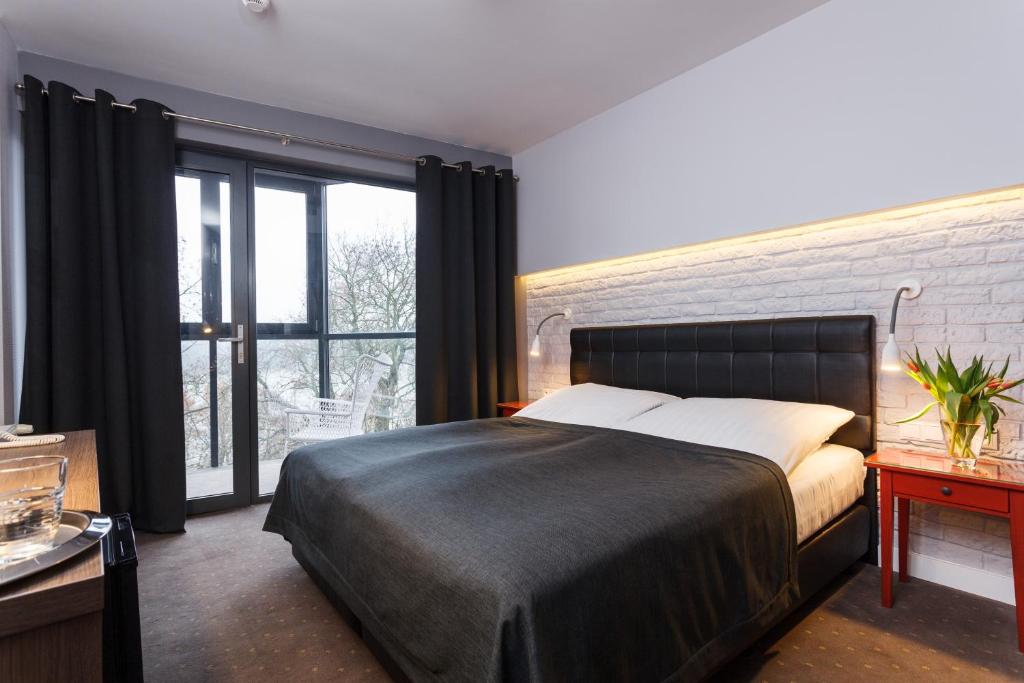 Chambre de l'Hotel Czarna Roza à Torun.