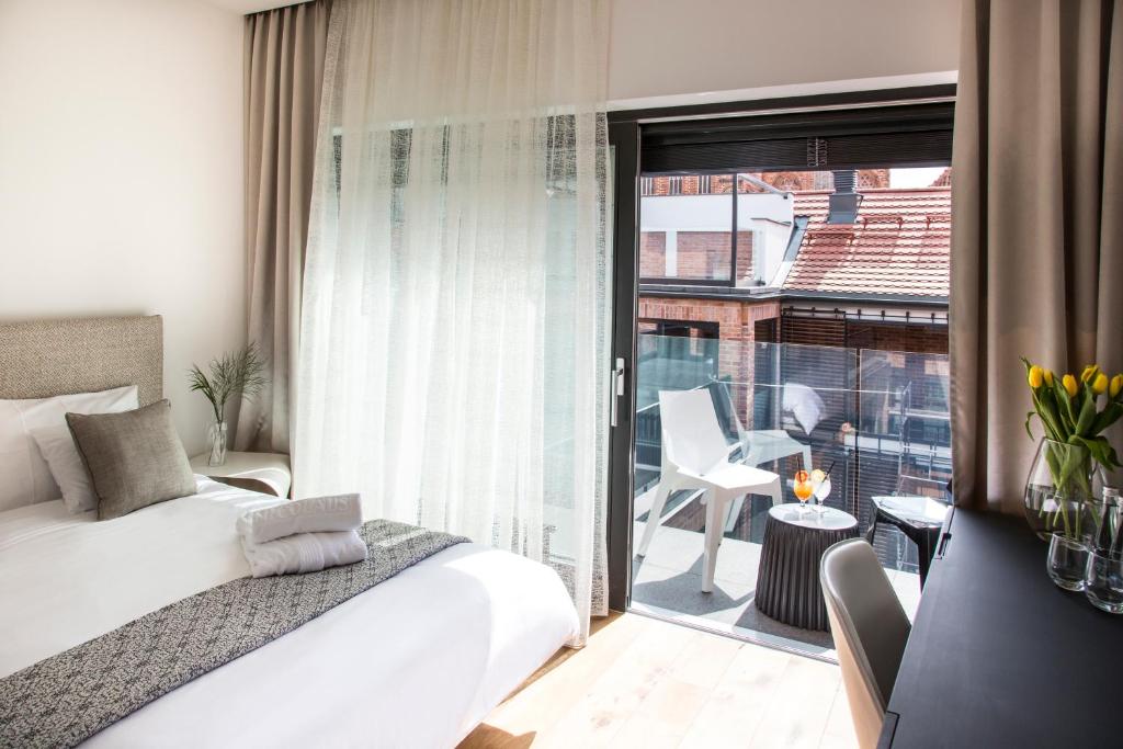 Chambre de l'Hotel Nicolaus à Torun.