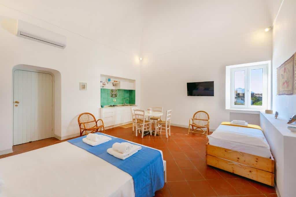 Chambre de l'appartement hotel Torretta Corricella - Punta Serra à Procida.
