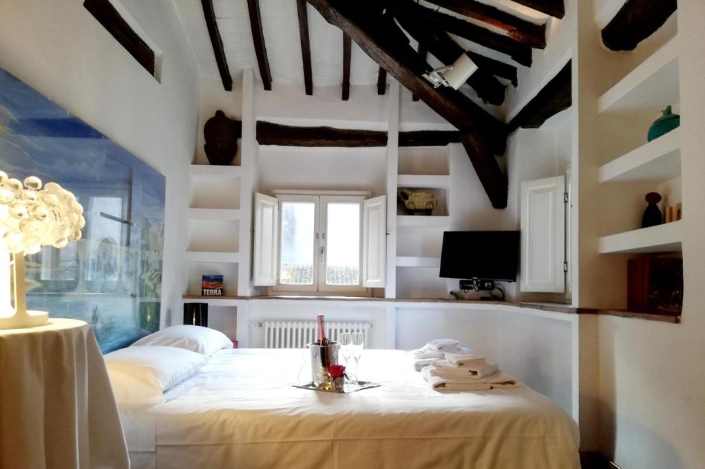 Chambre du Luxury rooms Trastevere à Rome.