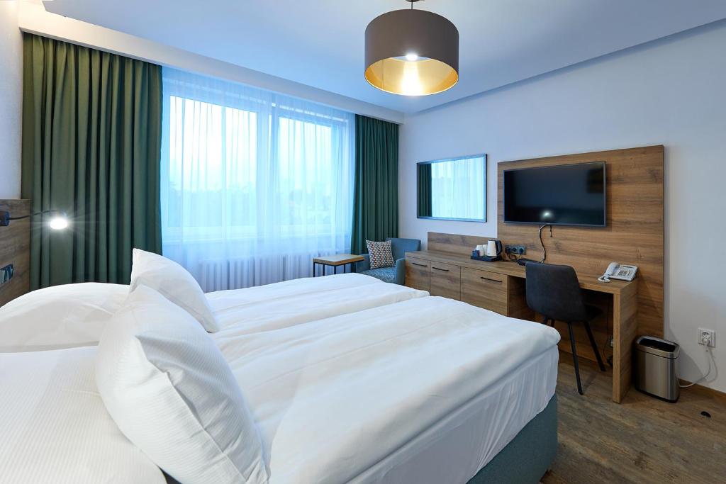 Chambre de l'Hotel Central Park Flora à Olomouc.
