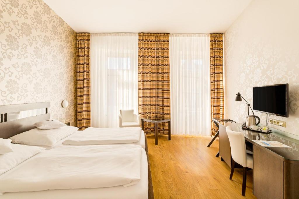 Chambre de l'Hotel Trinity à Olomouc.